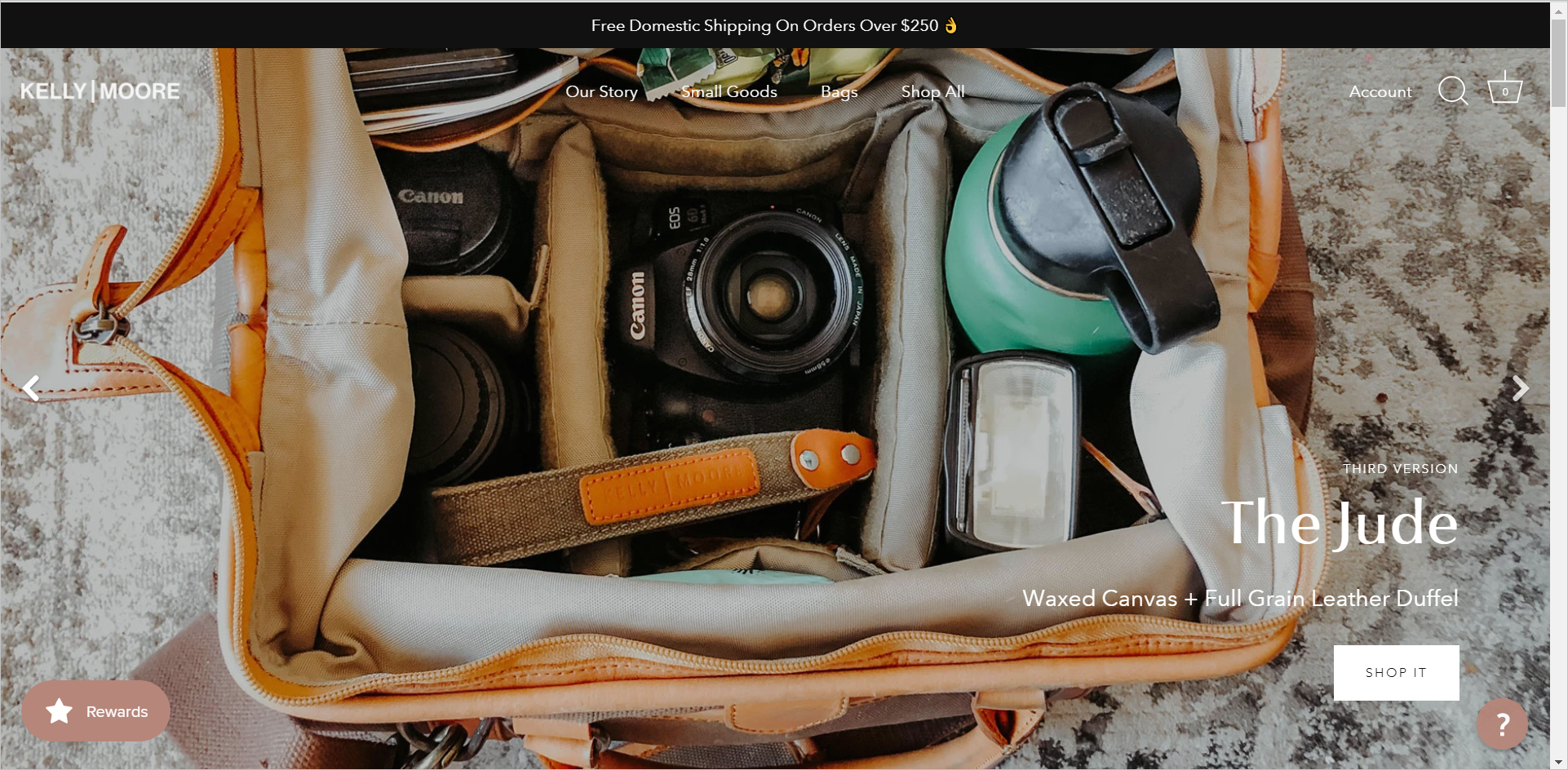 Kelly Moore Taschen-Homepage conversion rate optimization for e-commerce - cumbersome navigation due to false bottom example - kellymoorebags.com's homepage uses a large graphic as background image that takes up the entire above-the-fold real estate, making navigation elements obscure