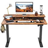 FEZIBO Birou electric pe picioare reglabil pe înălțime cu sertar dublu, masă de 48 x 24 inchi cu raft de depozitare, birou stand stand cu bord de îmbinare, cadru negru/Suport maro rustic, 48 inchi