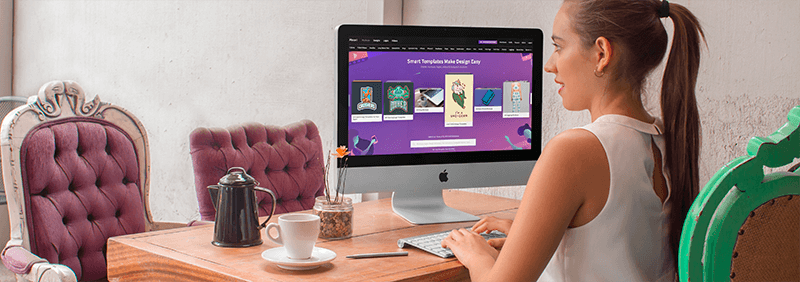 Imac-Modell einer jungen Frau, die in einem Kreativbüro an einem Imac arbeitet