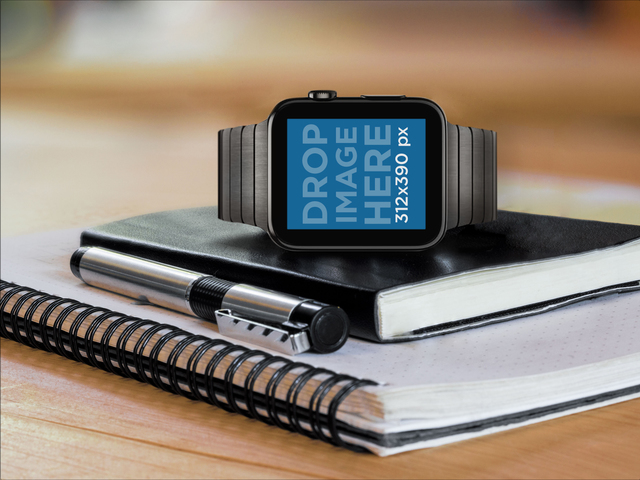Black Apple Watch Over a Moleskine Mockup Template Placeit Stage Image