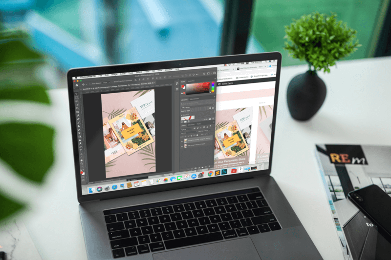 Modell eines Macbook Pro, das von einer Zeitschrift auf einem Schreibtisch platziert wurde