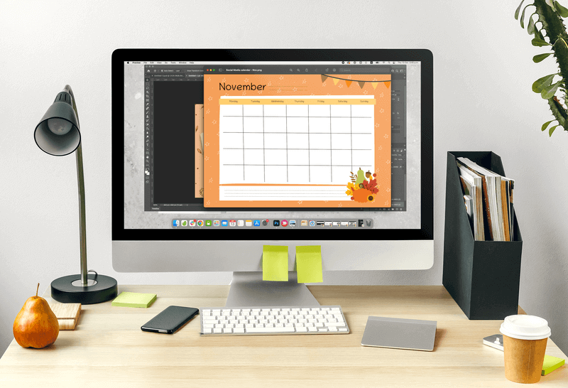 Machetă a unui Imac cu un calendar social media din noiembrie