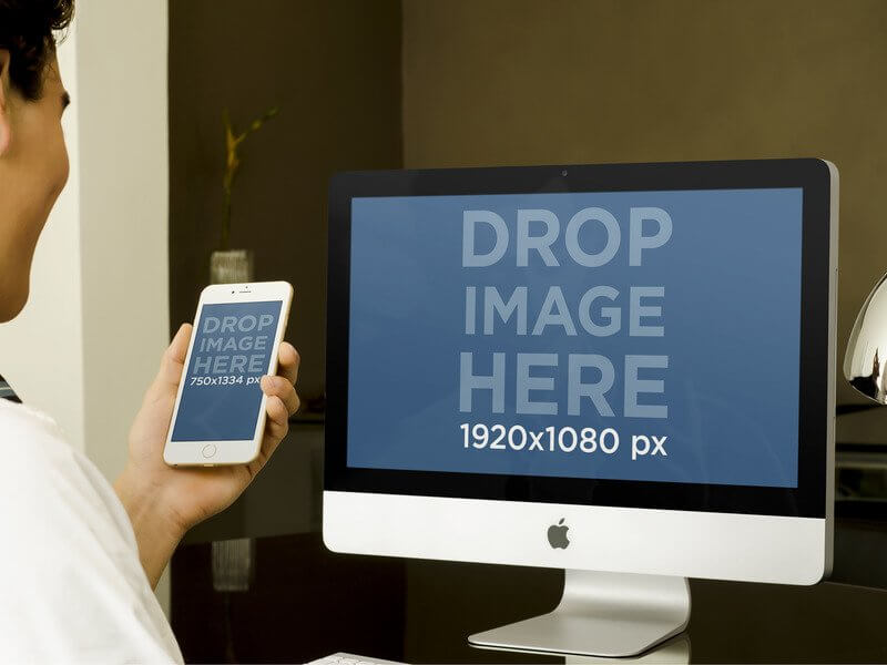 Iphone 6 和 Imac 样机的商人在办公室