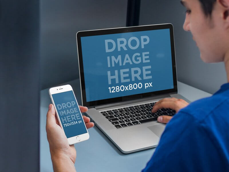 Iphone 6 和 Macbook Pro 样机在办公室隔间